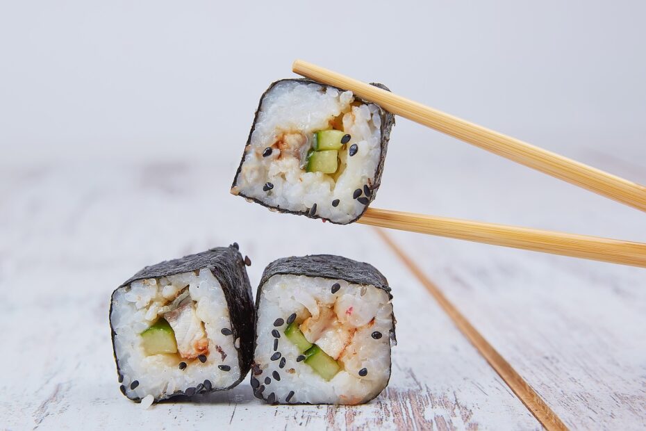 Sushi rolls paired with a Saison farmhouse ale — rustic Belgian-style beer with bright, food-friendly character